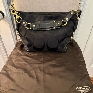 Coach Black Signature Carly Hobo Shoulder Bag with Brass Hardware